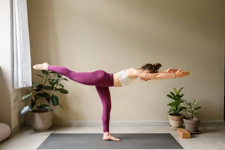 Achieving the Perfect Tone: How Often Should You Exercise for Results? 1 Woman doing Yoga exercise Southampton to help with toning the body.