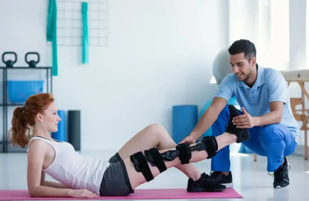 Debunking Meal Timing Myths: The Truth About Muscle Recovery 1 Woman having treatment to help muscle recovery Southampton after an injury