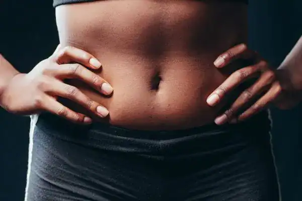 Toning Your Stomach: The Ultimate Guide to Achieving a Sculpted Stomach While Shedding Pounds 1 Image of a toned stomach after non surgical treatment Southampton